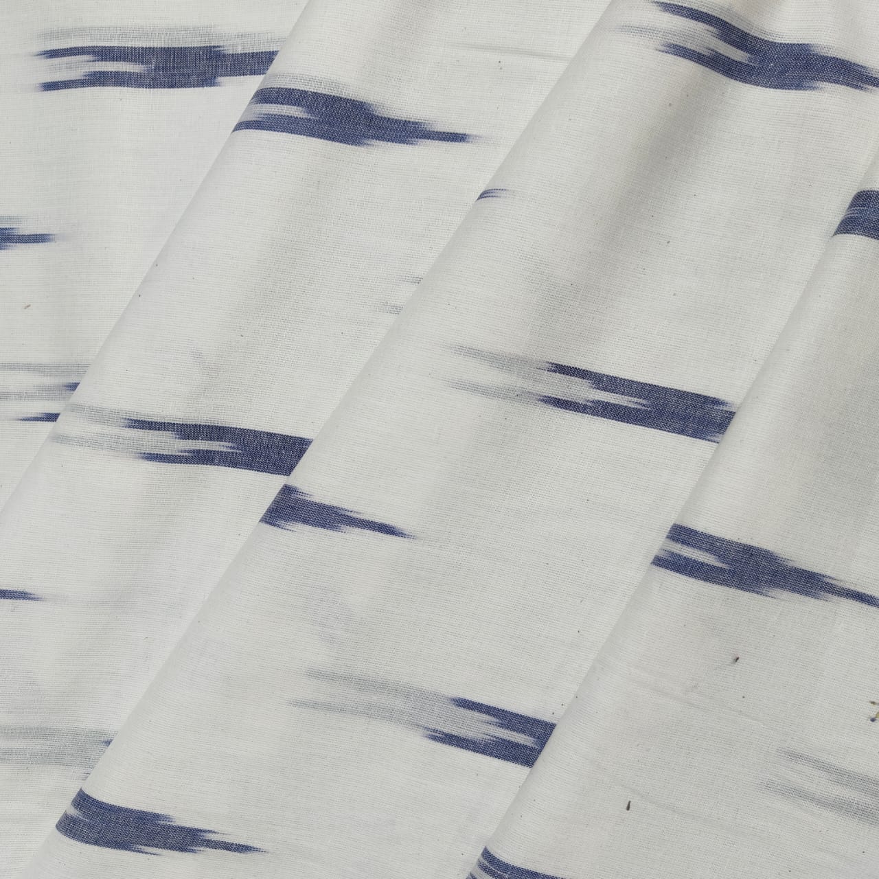 White Blue Ikkat Print Cotton Fabric