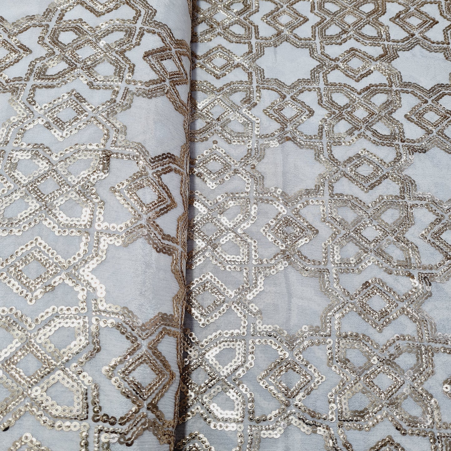 Off White & Gold Sequence Embroidery Dyeable Chinnon Fabric - TradeUNO