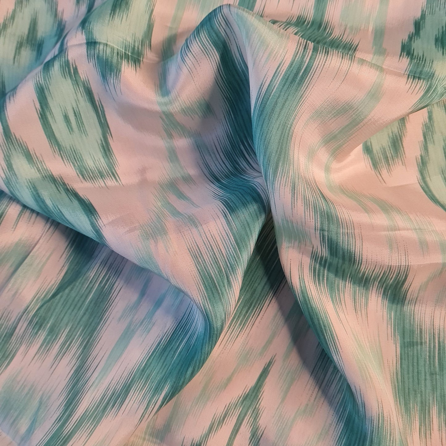 Exclusive Green Multicolor Ikkat Print Crepe Fabric