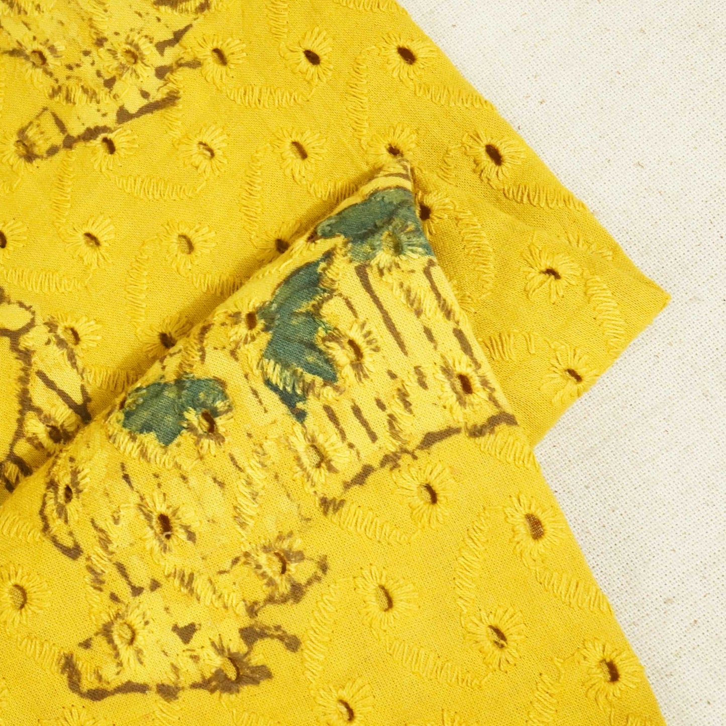 Mustard Yellow Pichwai Ajrakh Print Cotton Schiffli Fabric CG-25522