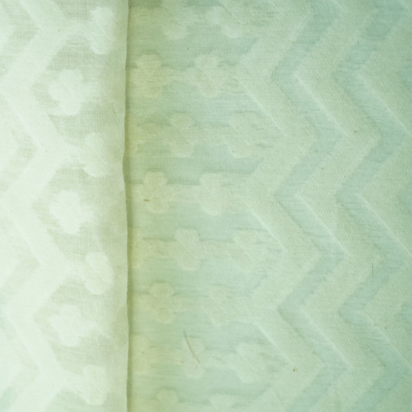 Off White Floral Handloom Dyeable Cotton Staple Fabric