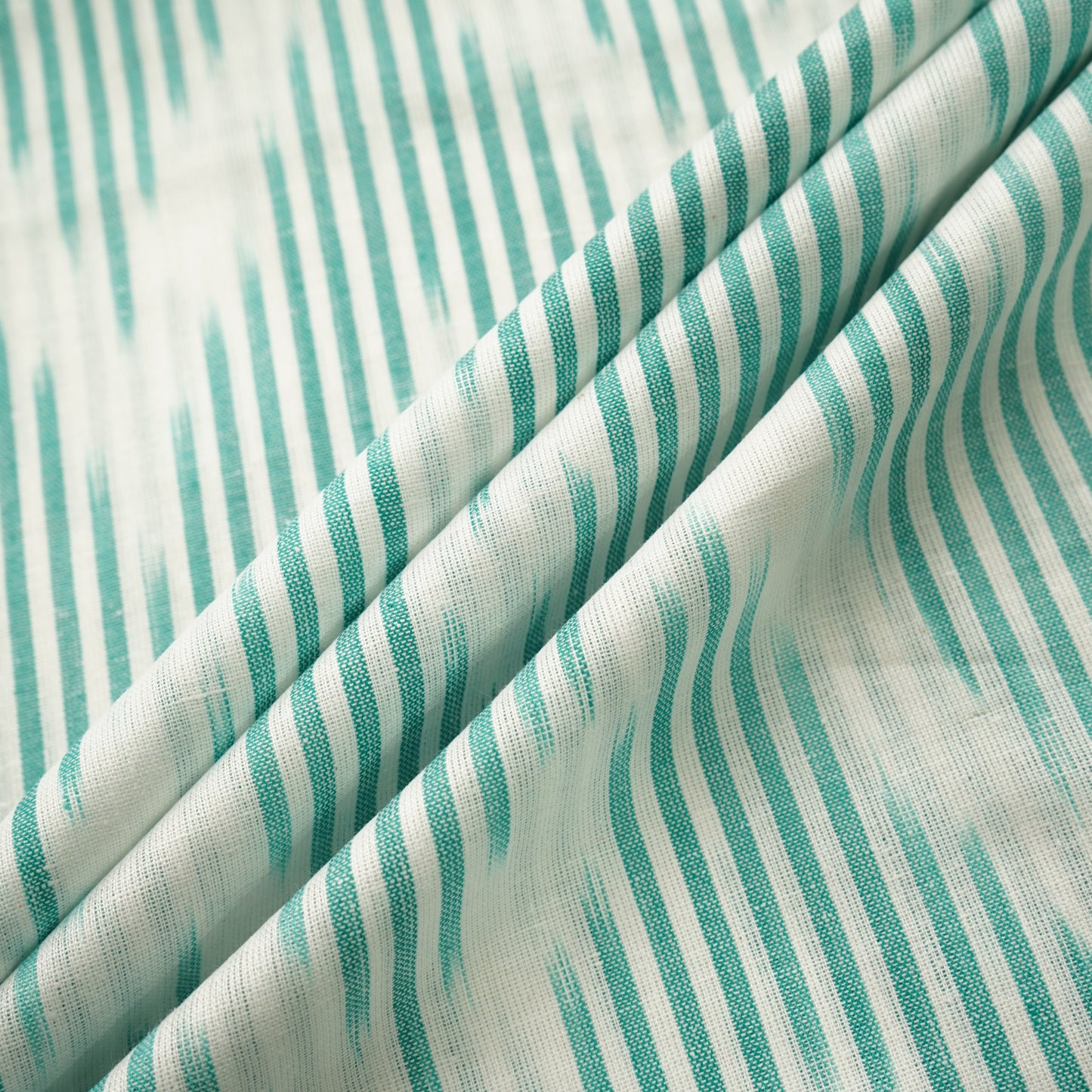 White Green Ikkat Print Cotton Fabric