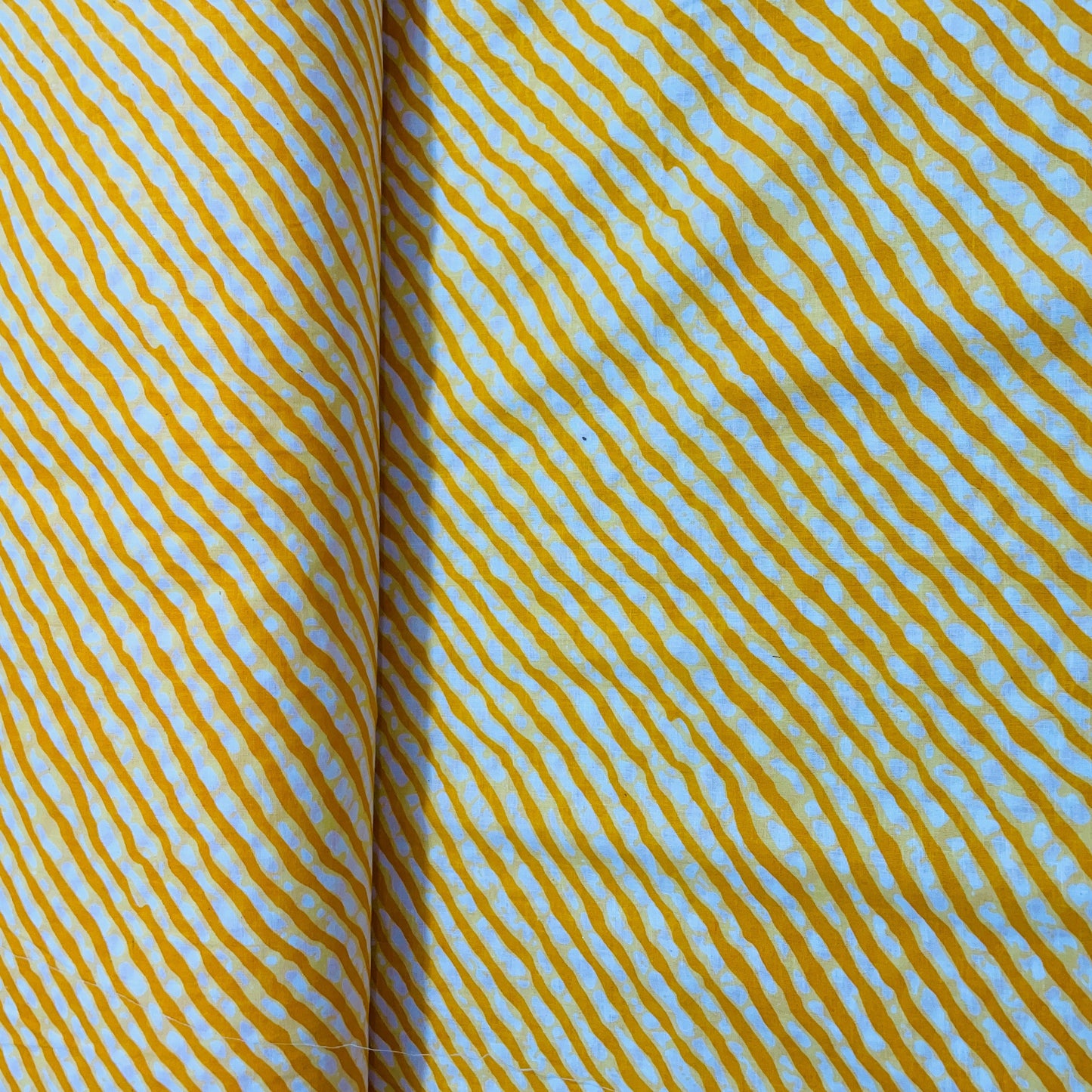 White & Yellow Lehriya Print Cotton Fabric - TradeUNO