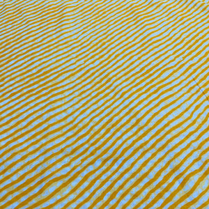 White & Yellow Lehriya Print Cotton Fabric - TradeUNO
