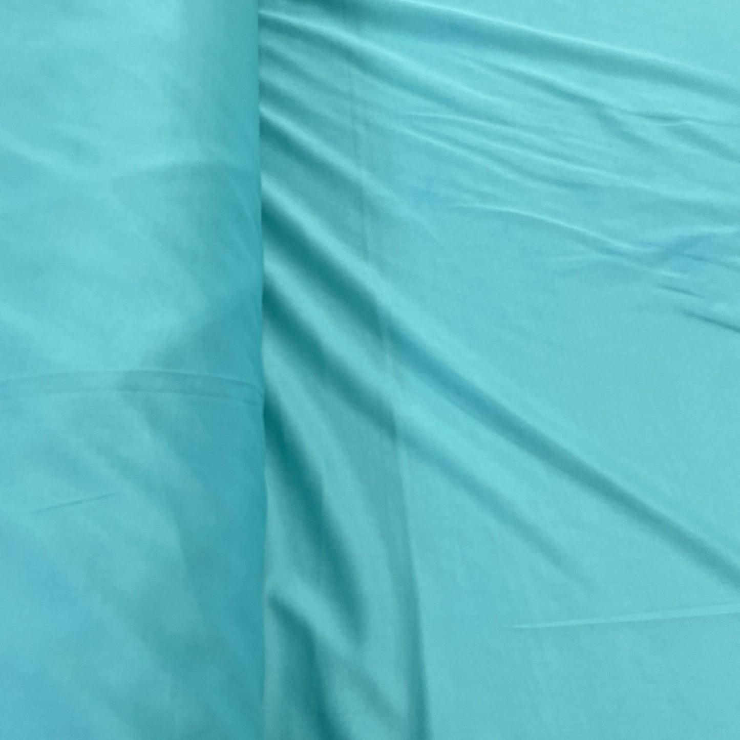 Turqousie Green Solid Lycra Dyed Fabric