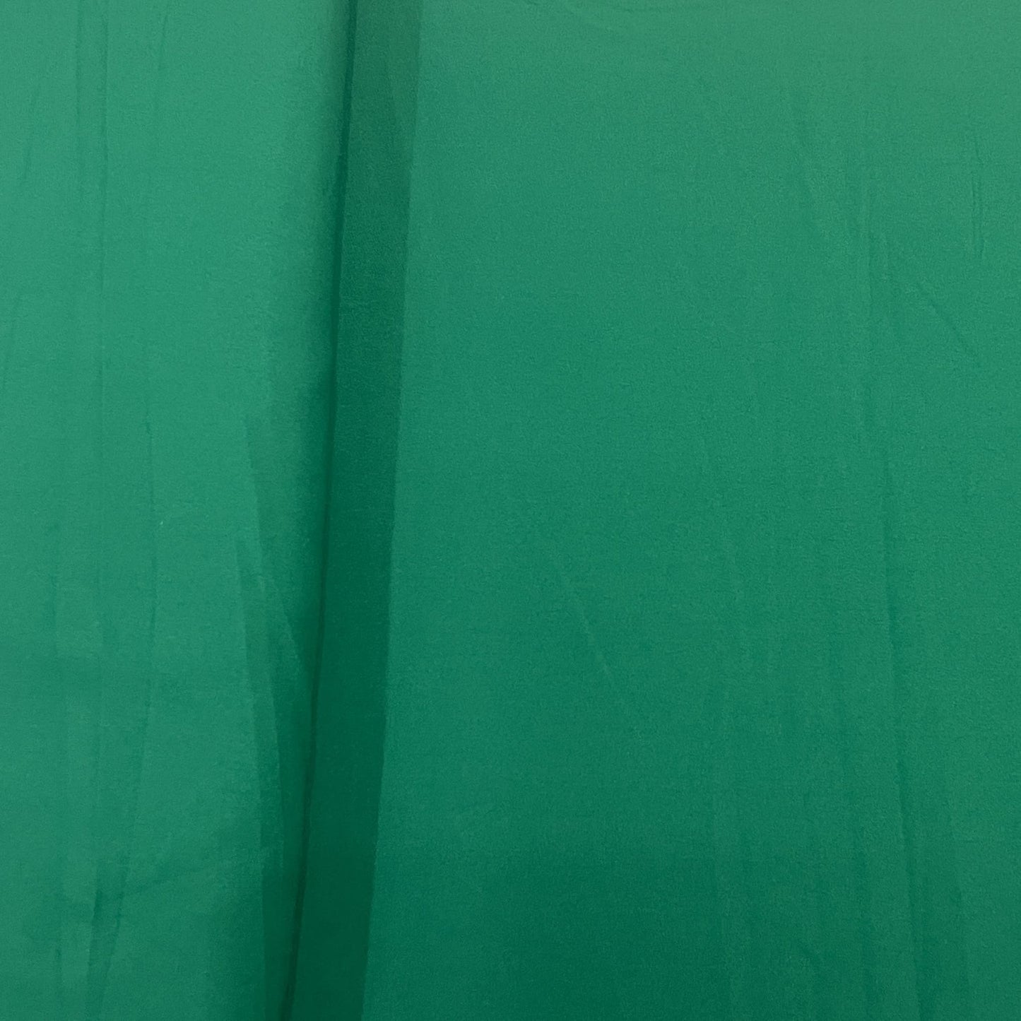 Exclusive Pine Green Solid Malai Crepe Fabric