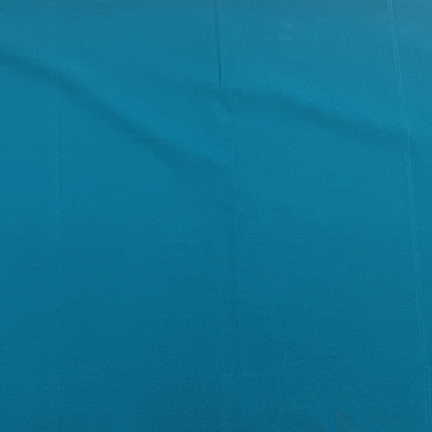 Exclusive Teal Green Solid Malai Crepe Fabric