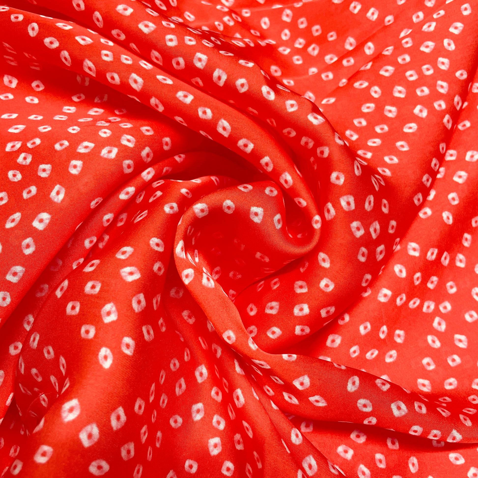 Red Bandhani Print Georgette Satin Fabric - TradeUNO
