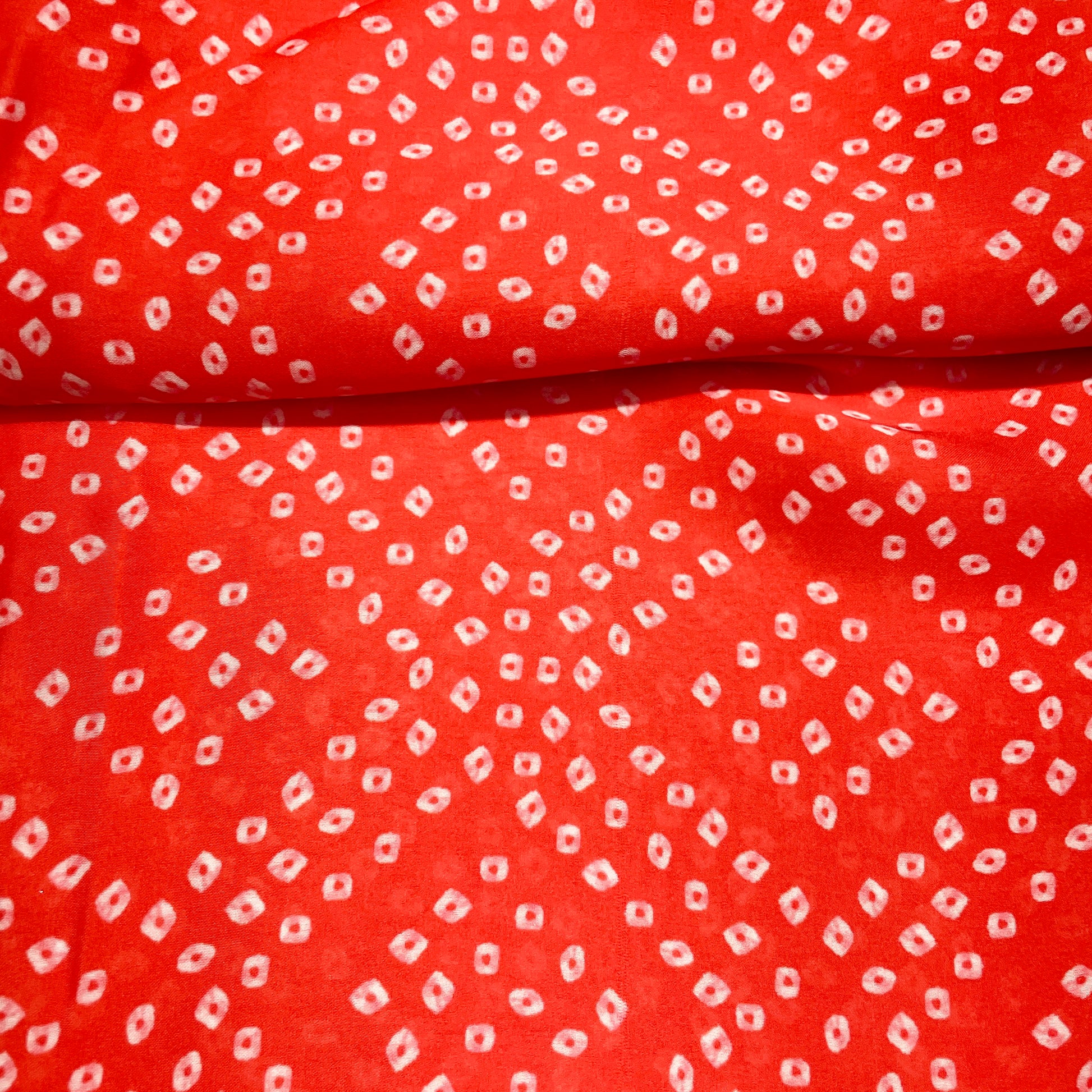 Red Bandhani Print Georgette Satin Fabric - TradeUNO