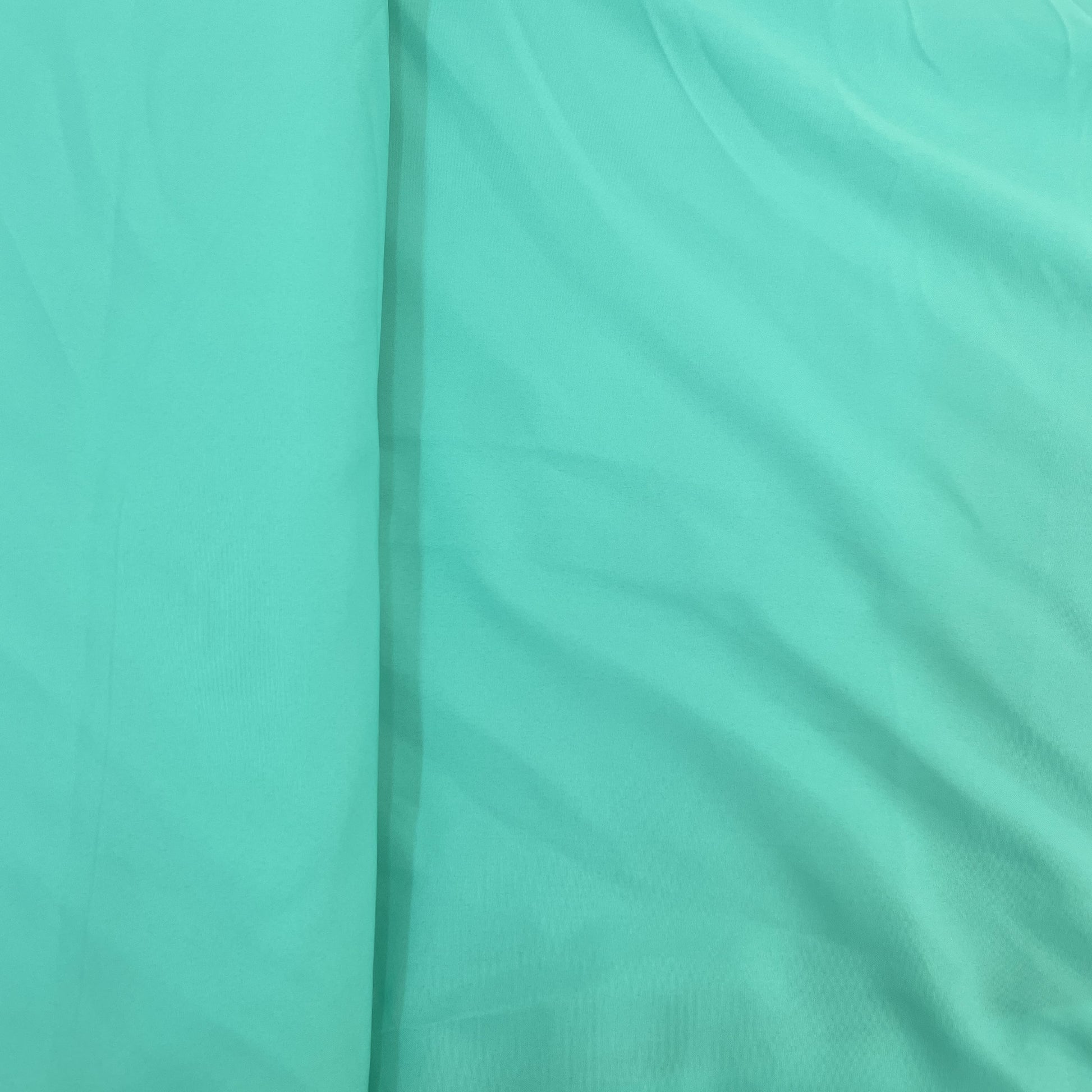 Exclusive Mint Green Solid Malai Crepe Fabric