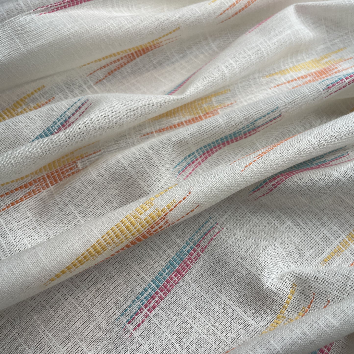 Premium OffWhite Orange Multicolor Ikkat Dobby Embroidery Dyeable Cotton Fabric