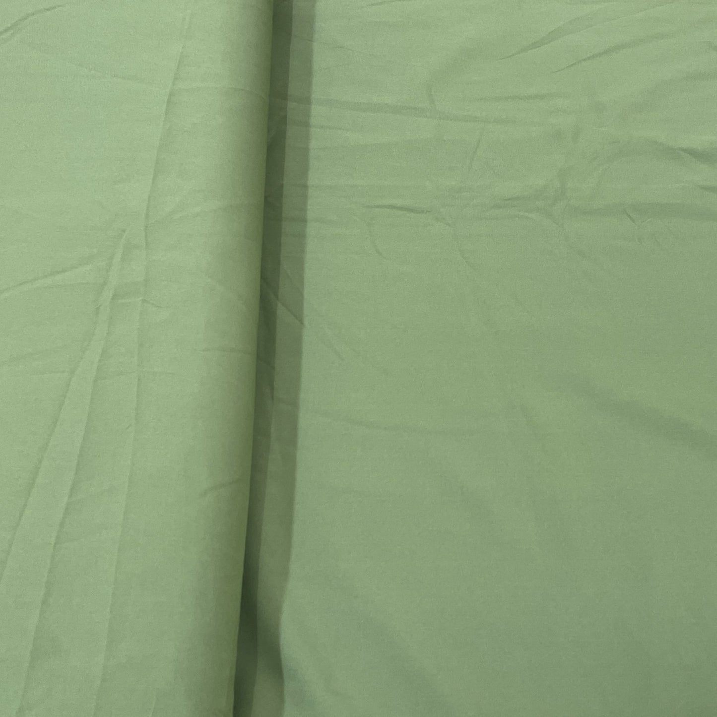Exclusive Jungle Green Solid Malai Crepe Fabric