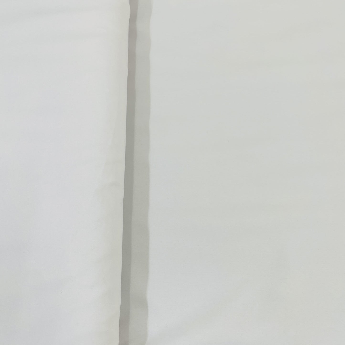 Exclusive White Solid Malai Crepe Fabric