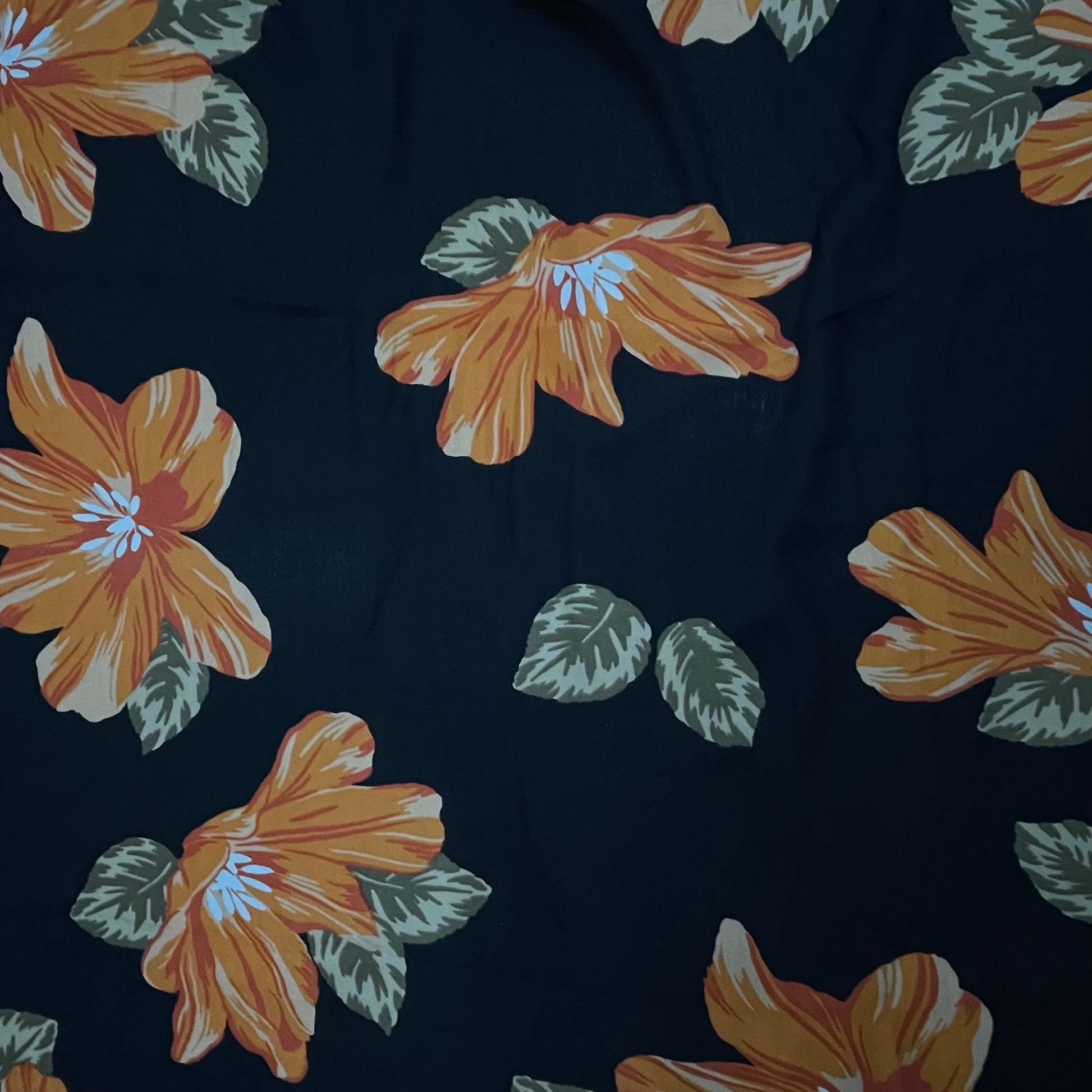 Black With Orange Floral Crepe Fabric - TradeUNO