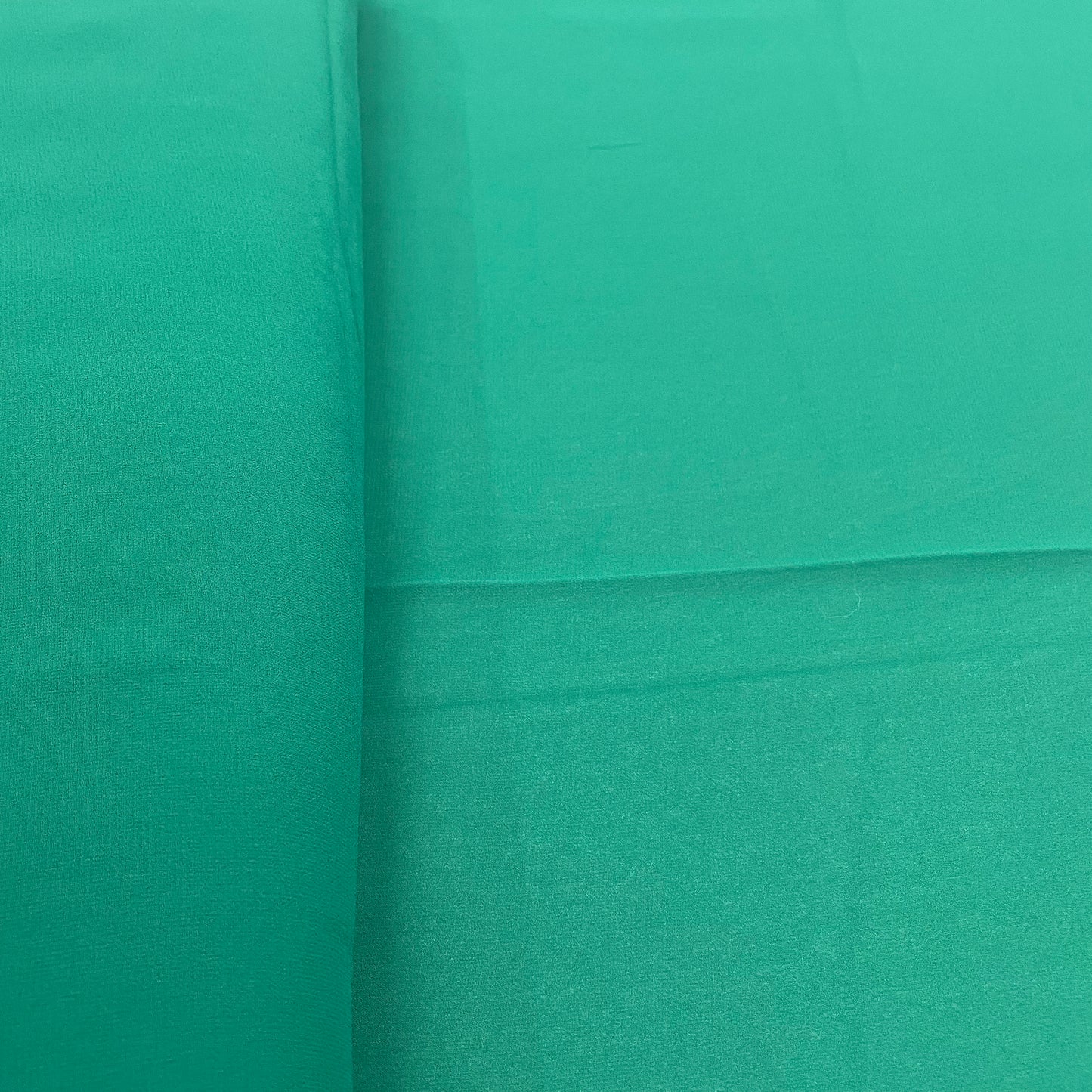 Cadmium Green Solid Georgette Fabric - TradeUNO