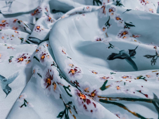 Printed cotton fabric with floral prints on it