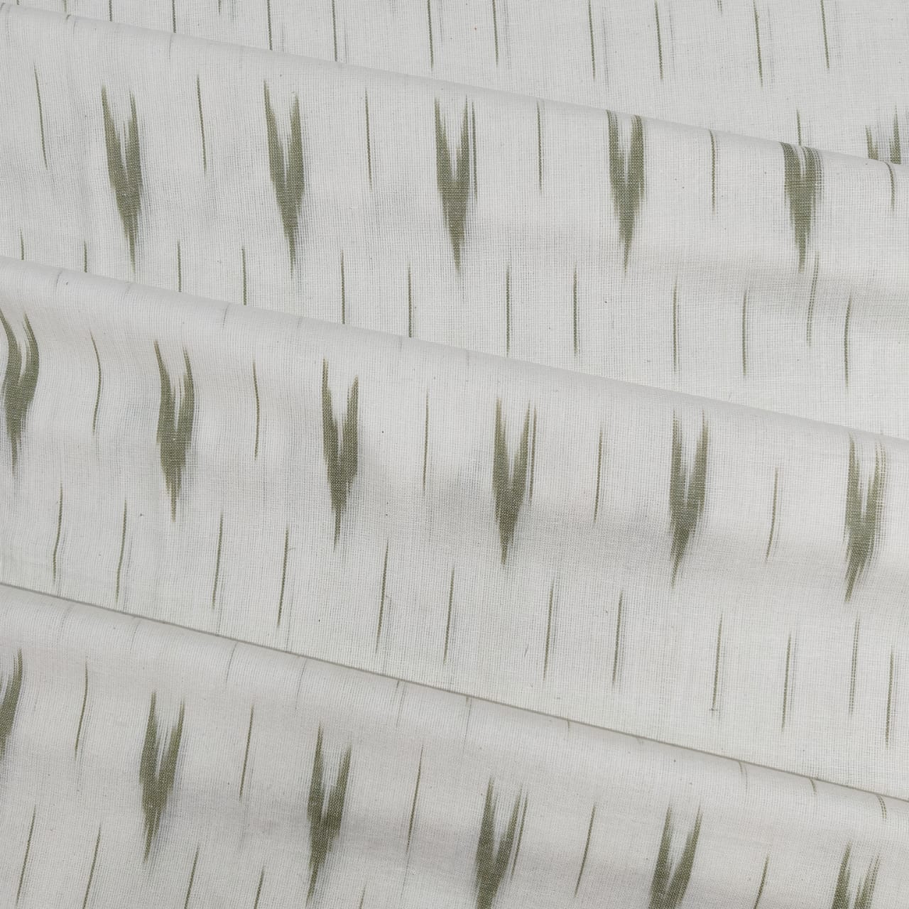 White Olive Green Ikkat Print Cotton Fabric