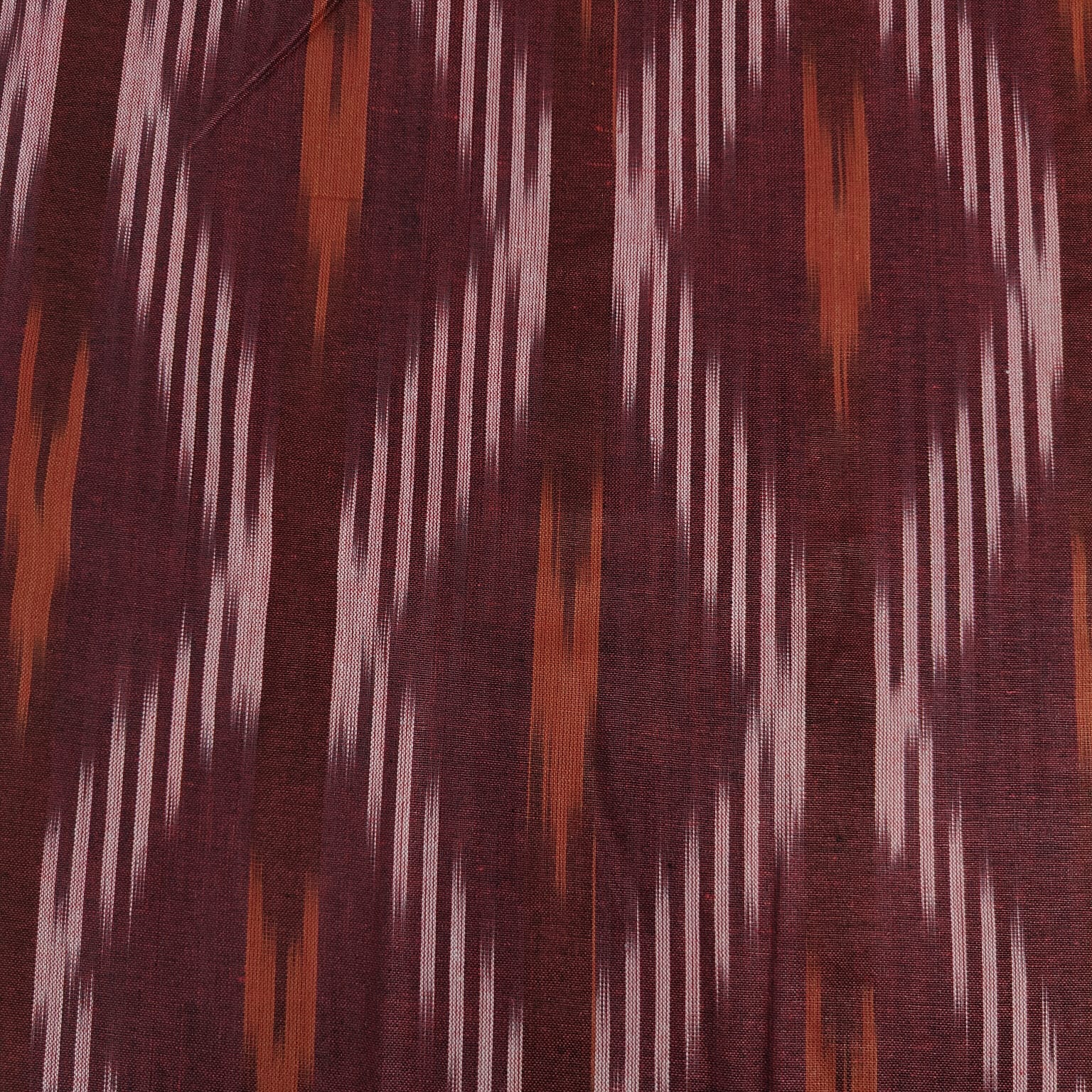 Maroon Orange Ikkat Print Cotton Fabric