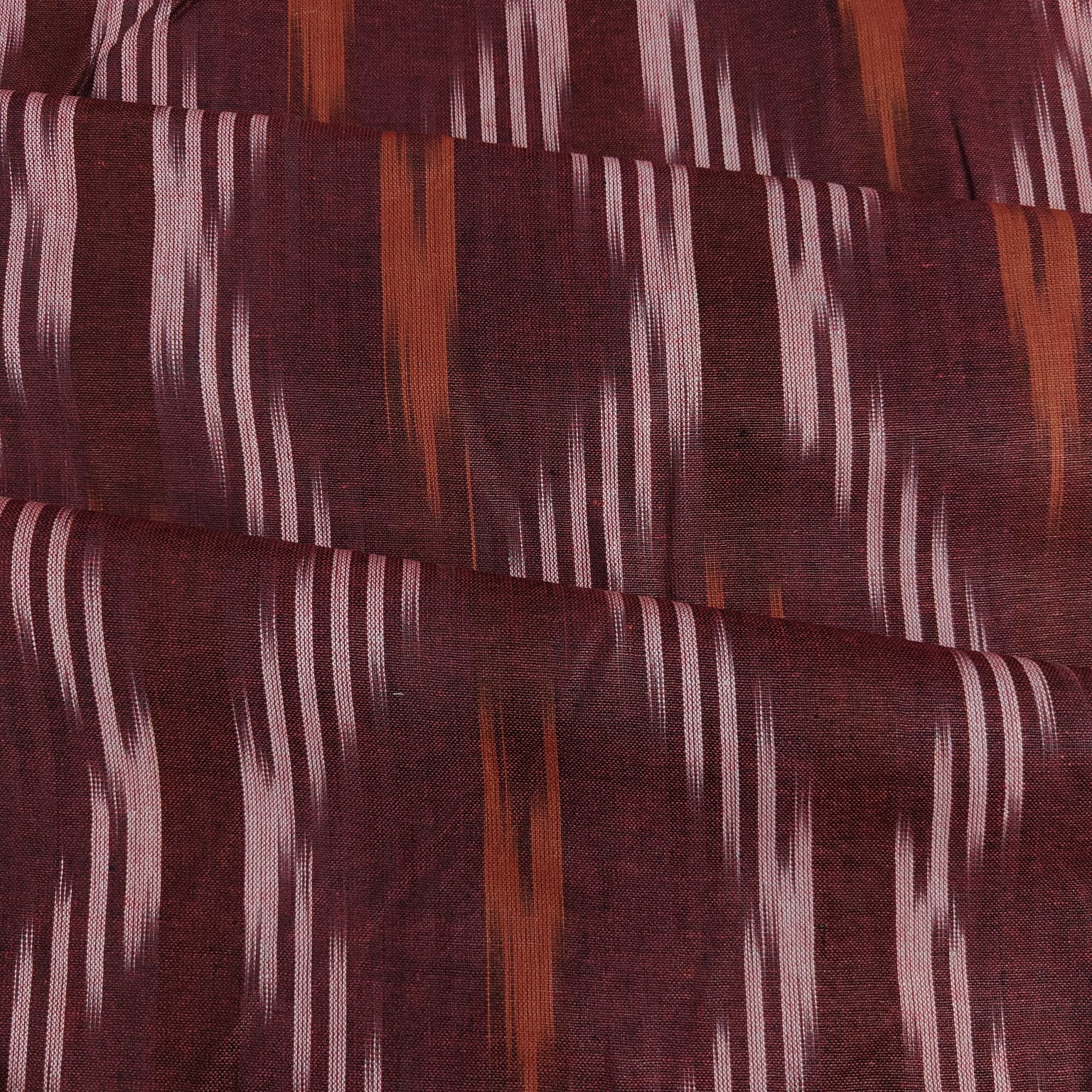 Maroon Orange Ikkat Print Cotton Fabric