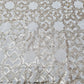 Off White & Gold Sequence Embroidery Dyeable Chinnon Fabric - TradeUNO