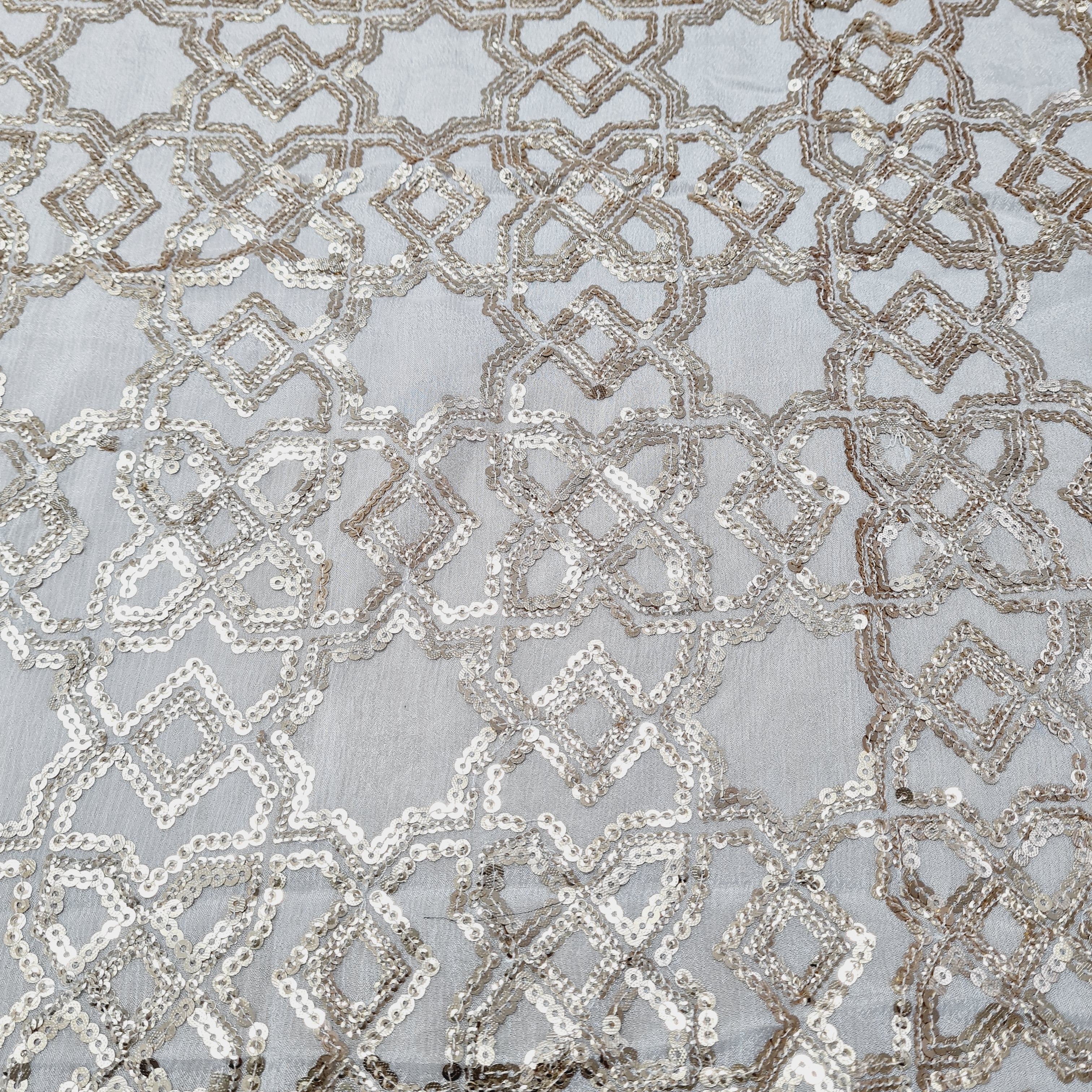Off White & Gold Sequence Embroidery Dyeable Chinnon Fabric - TradeUNO