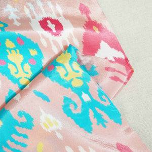 Peach Ikkat Print Crepe Fabric MTF-27240