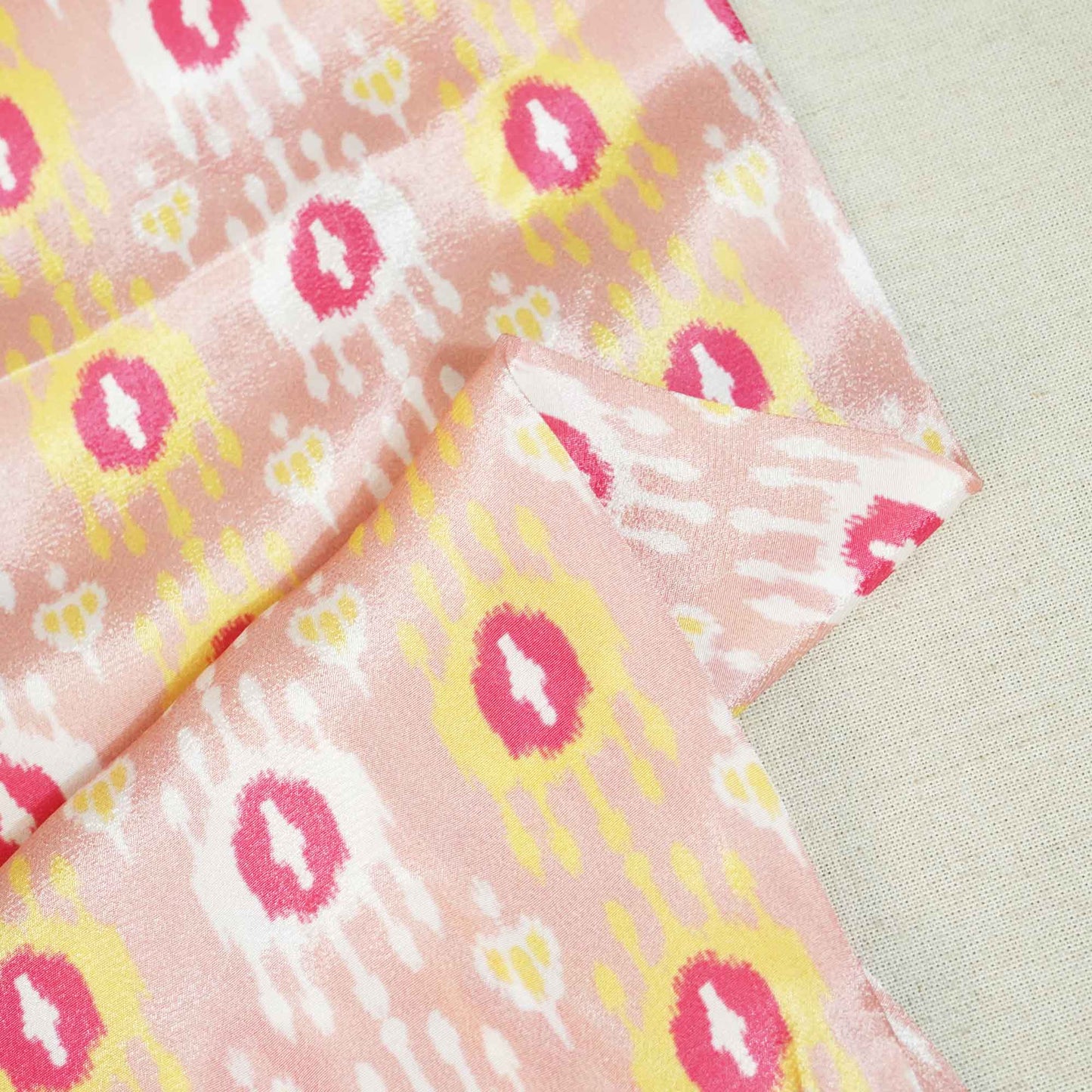 Peach Ikkat Print Crepe Fabric MTF-27241