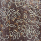 Brown Bandhani Print Chinon Fabric
