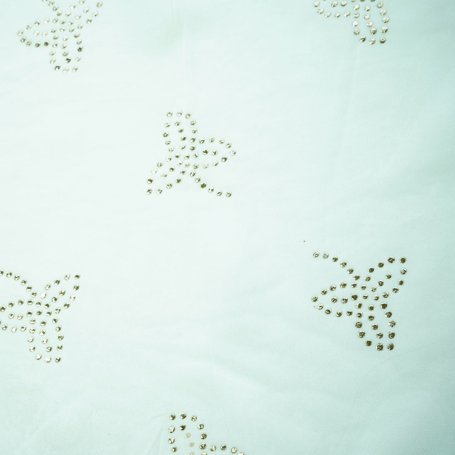 White Tropical Mukaish Work Georgette Dyeable Fabric