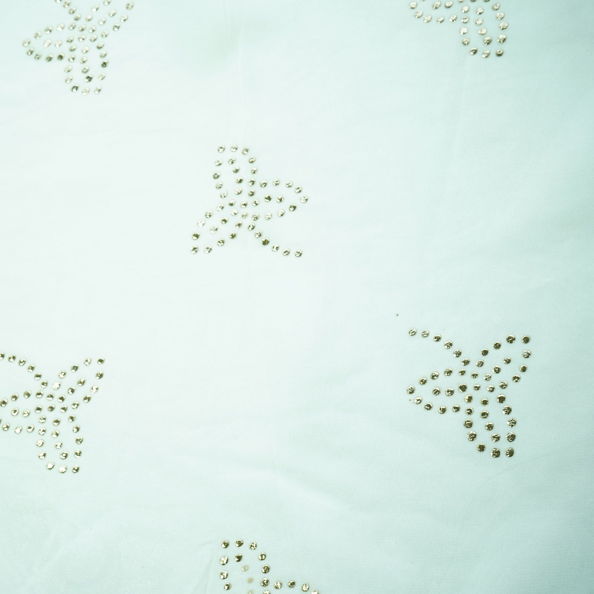 White Tropical Mukaish Work Georgette Dyeable Fabric
