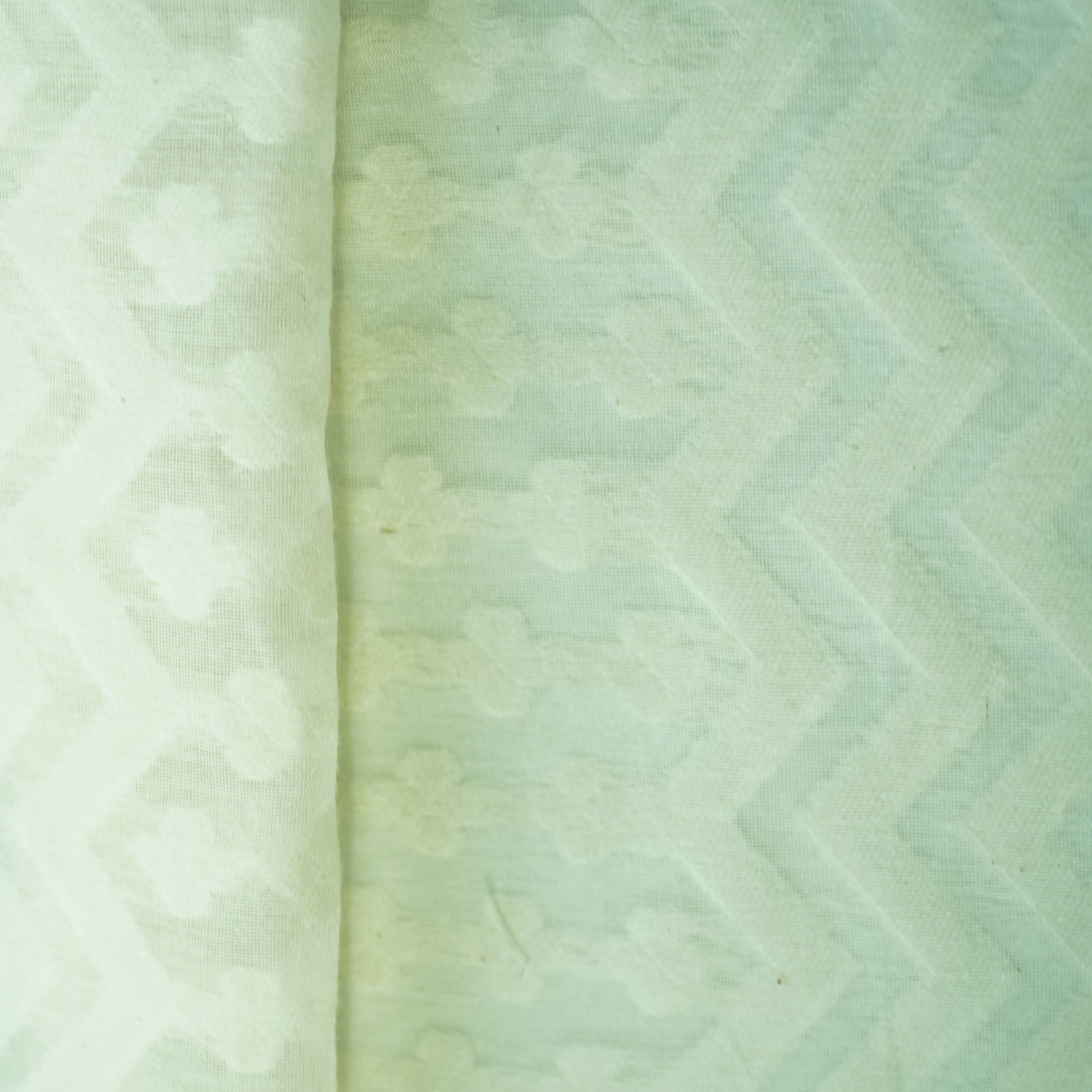 Off White Floral Handloom Dyeable Cotton Staple Fabric