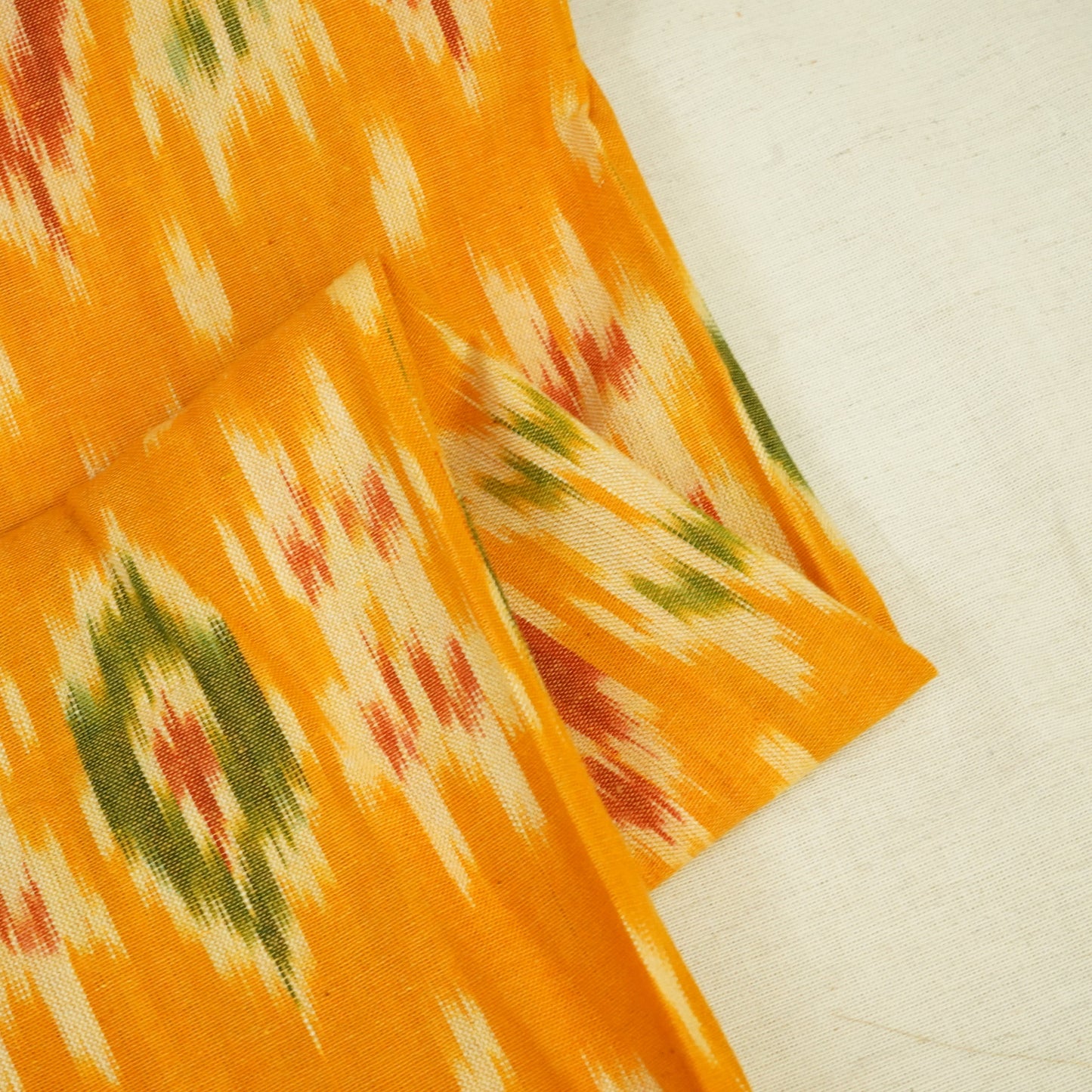 Mustard Ikkat Print Cotton Fabric 19942
