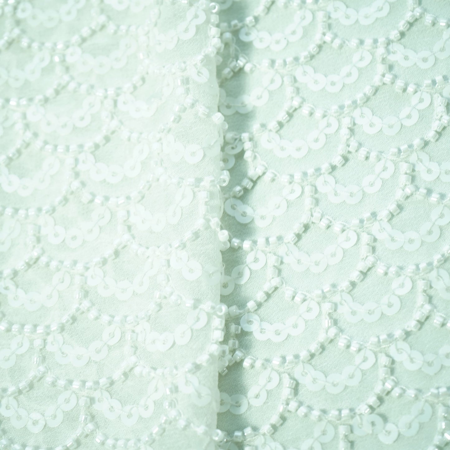 White Sequins Cut Dana Dyeable Georgette Fabric