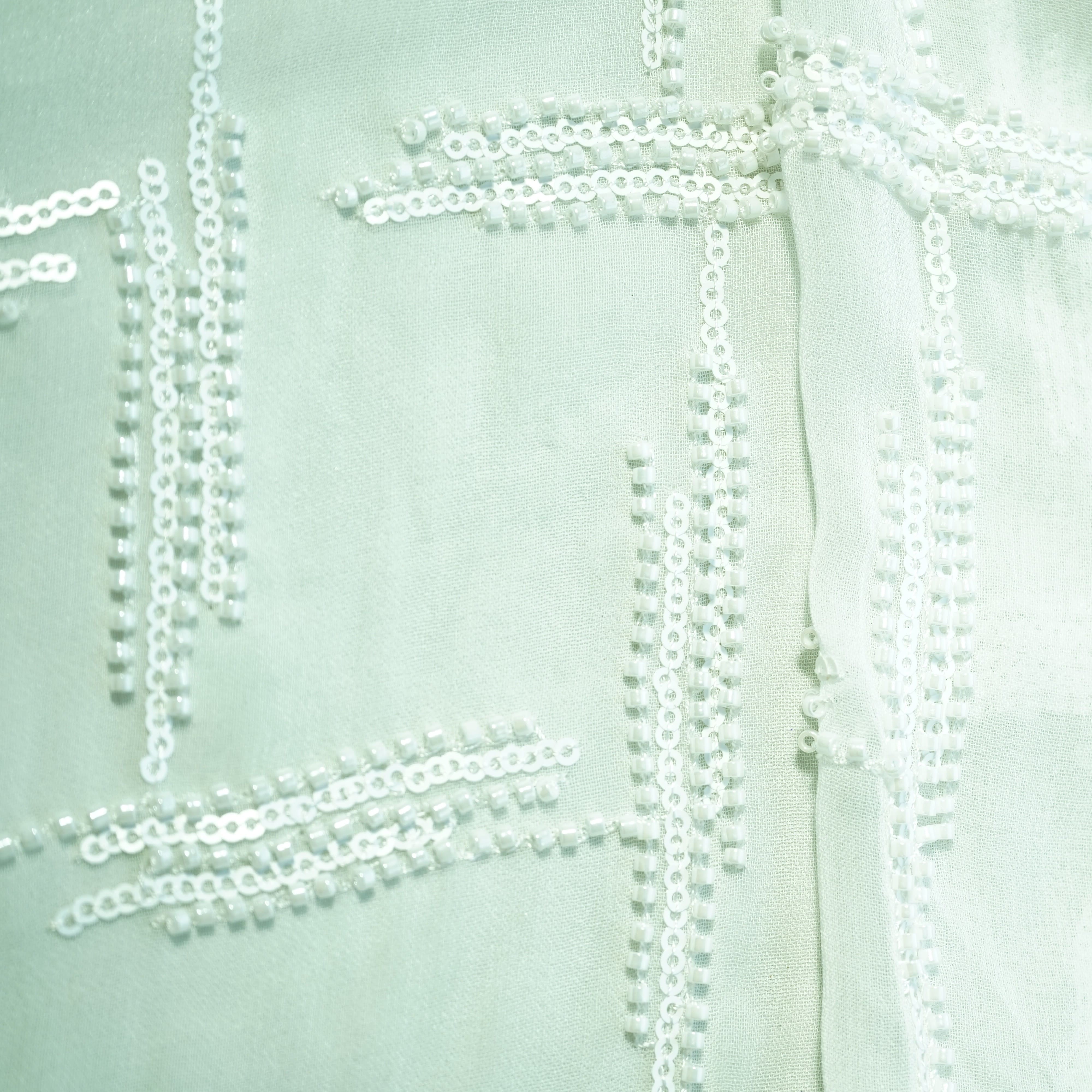 White Abstract Sequins Cut Dana Dyeable Georgette Fabric