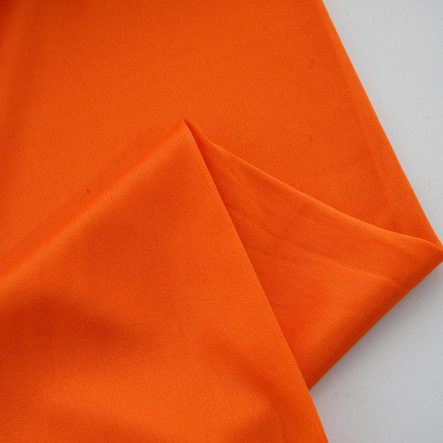 Orange Solid Lycra Dyed Fabric 12996