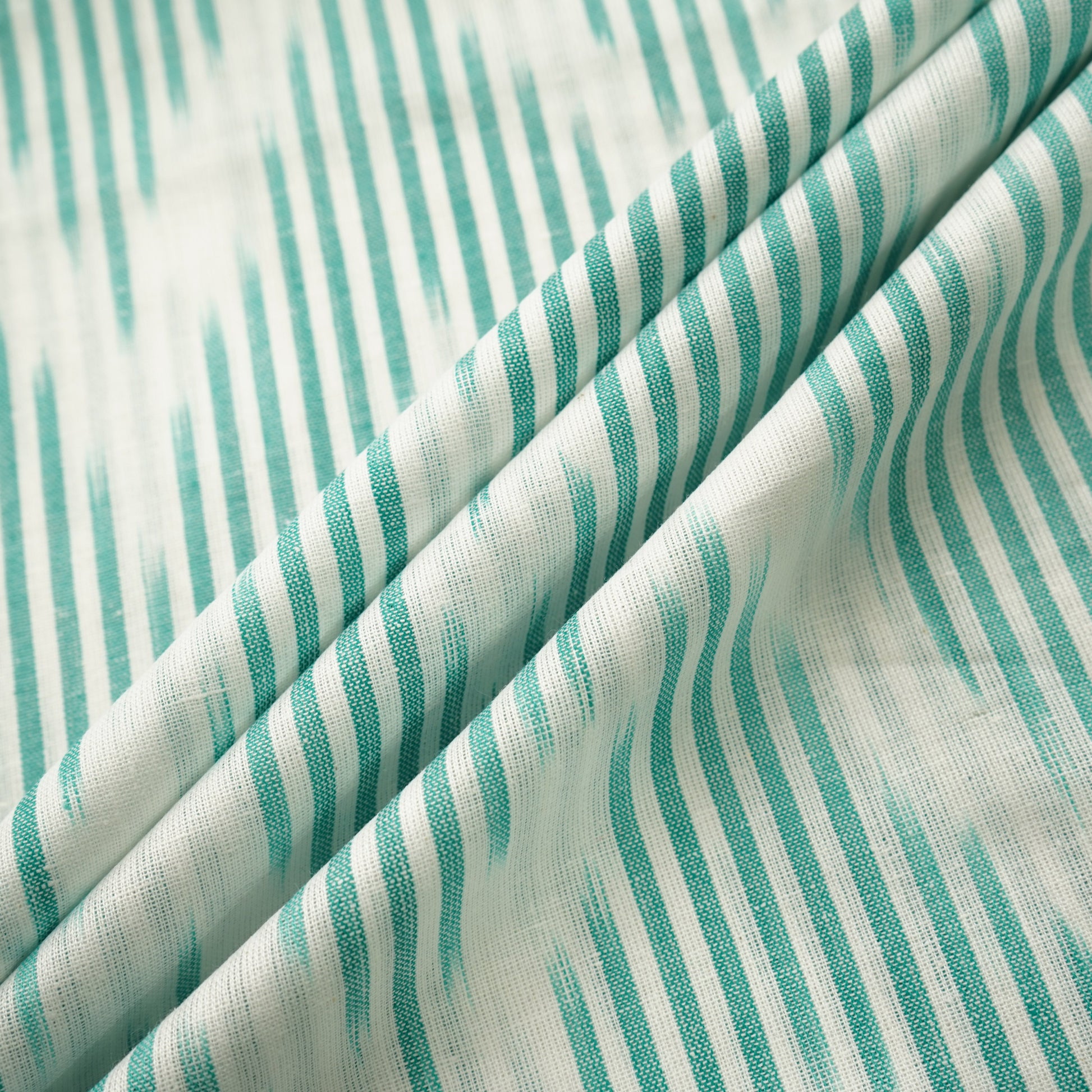 White Green Ikkat Print Cotton Fabric