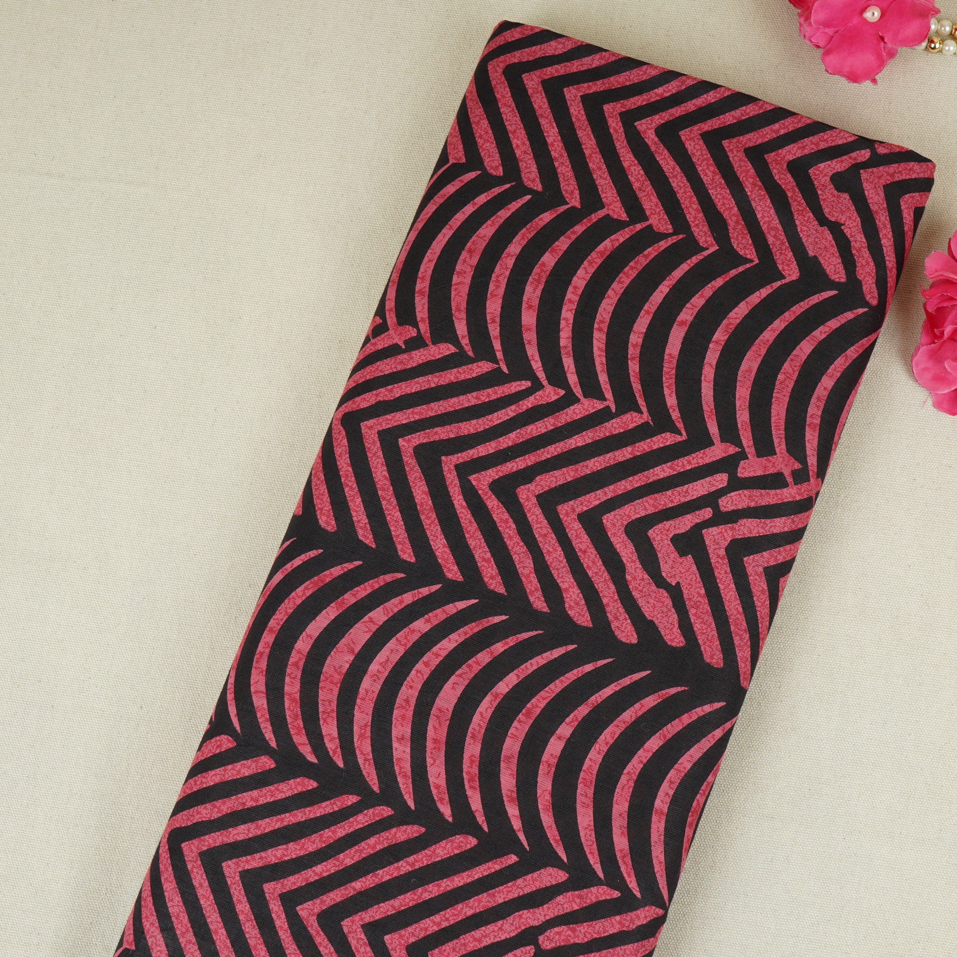 Pink & Black Abstract Print Cotton Fabric MFR-29850 - TradeUNO