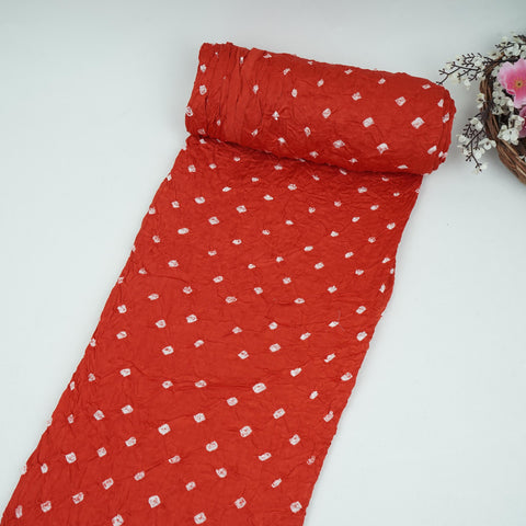 Red bandhani print modal satin fabric for festive ethnic wear