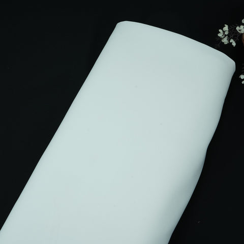 White banana crepe fabric with a soft flowy drape for western wear