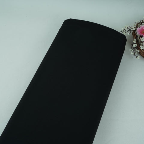 Black banana crepe fabric with a soft flowy drape for western wear