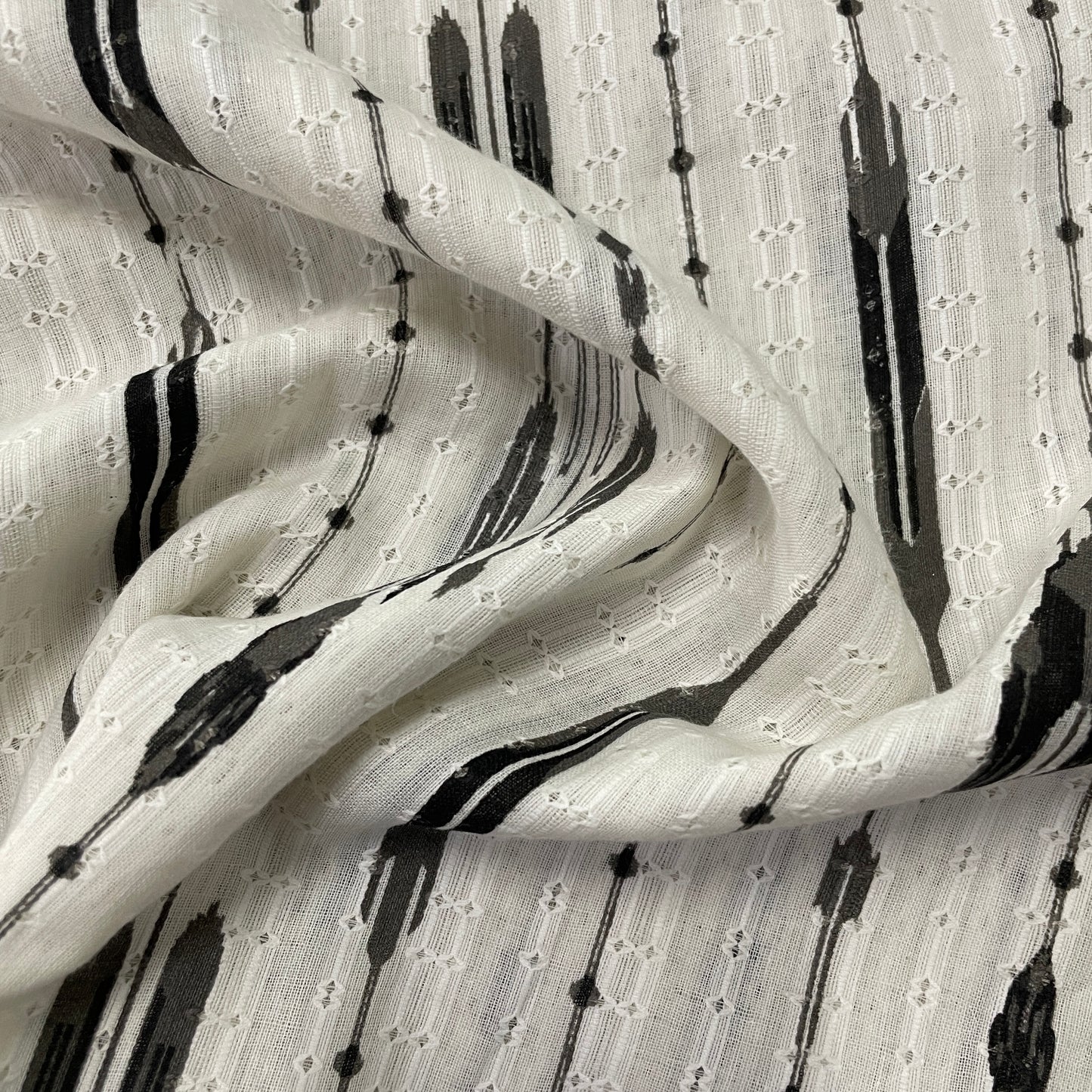OffWhite Black Ikkat Dobby Embroidery Dyeable Cotton Fabric