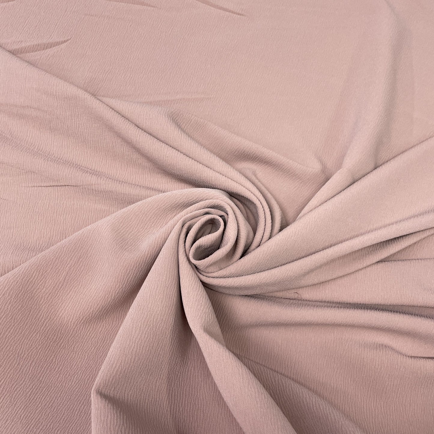 Dull Pink Solid Knitted Lycra Fabric