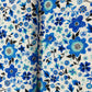 White Blue Floral Print Muslin Fabric - TradeUNO