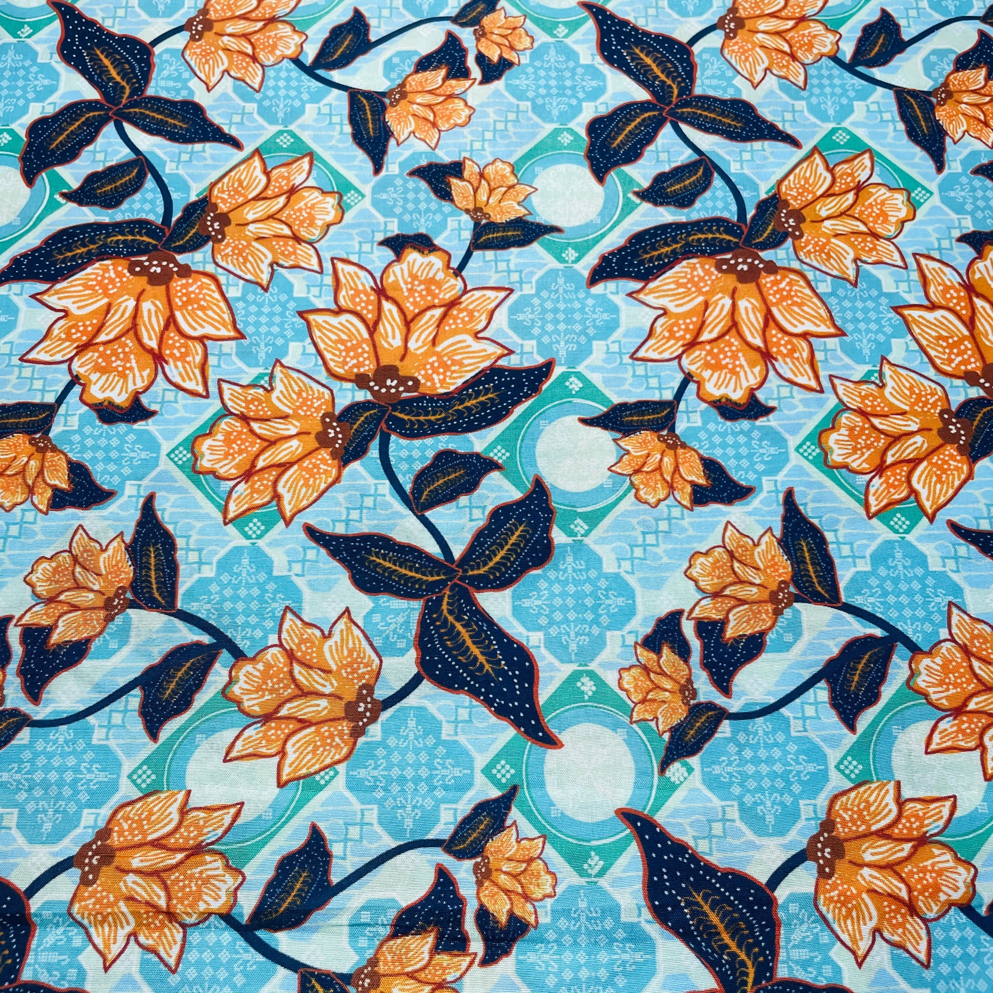 Sea Green Orange Hakokai Batik Floral Print Muslin Fabric - TradeUNO
