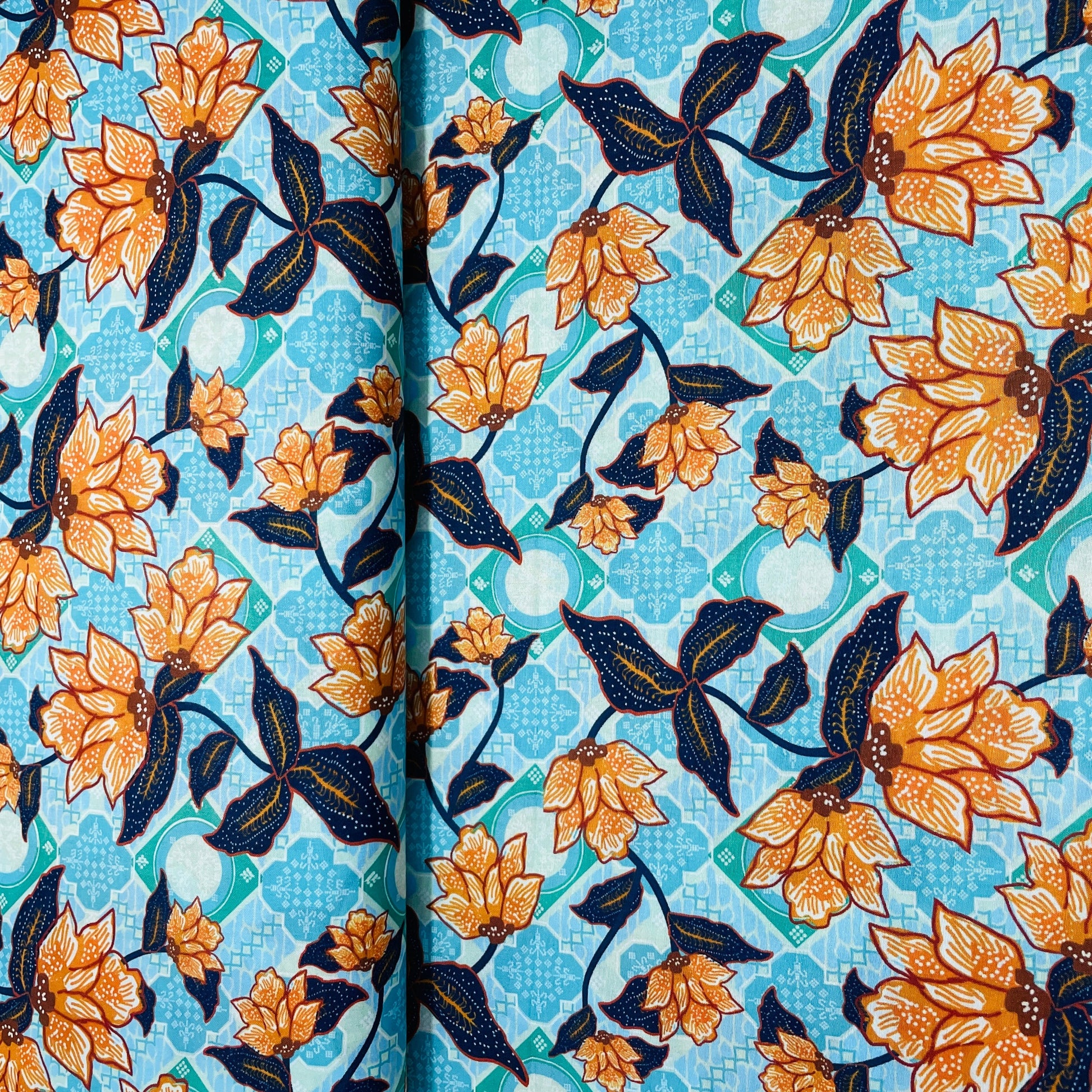 Sea Green Orange Hakokai Batik Floral Print Muslin Fabric - TradeUNO
