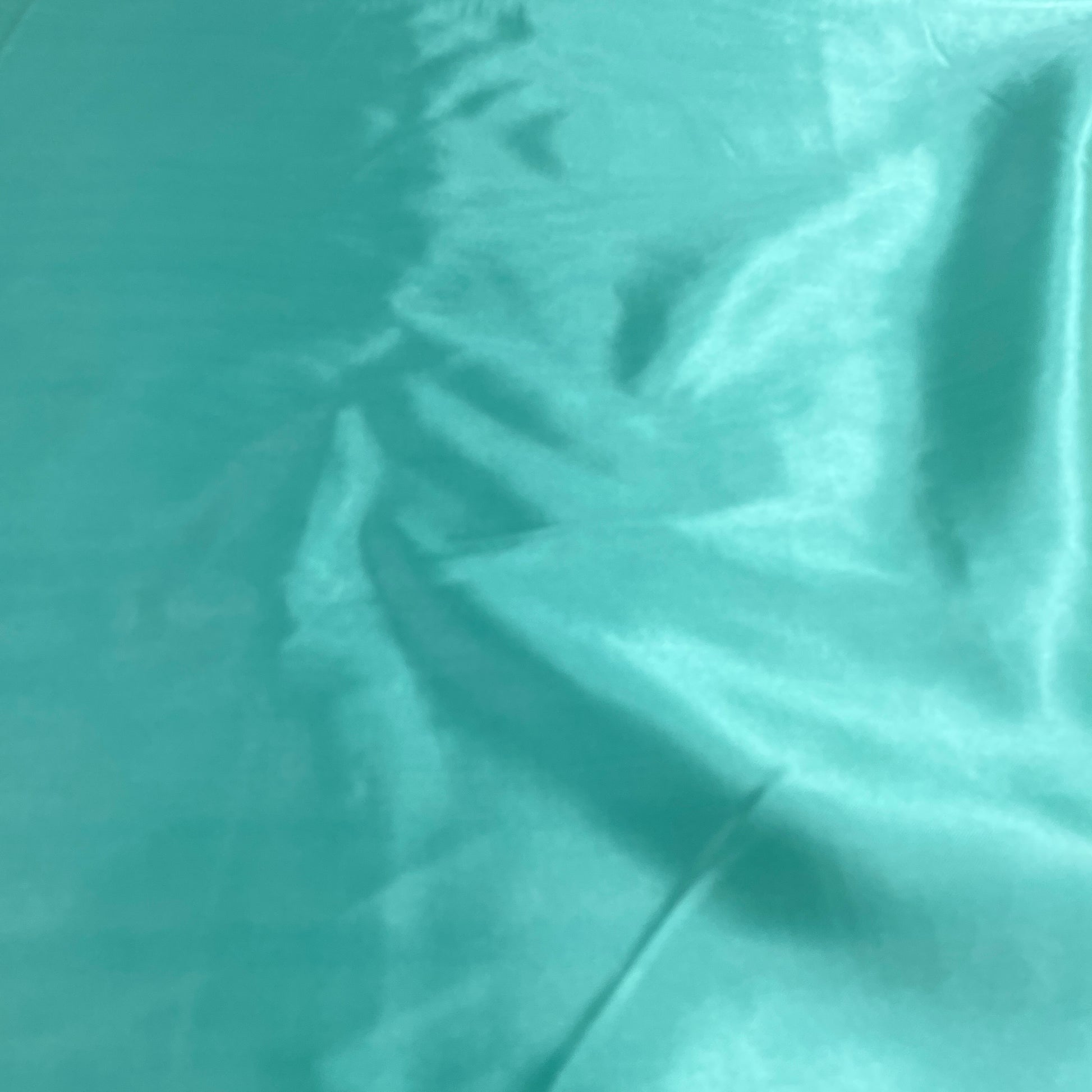 Seafoan Green Solid Satin Fabric - TradeUNO
