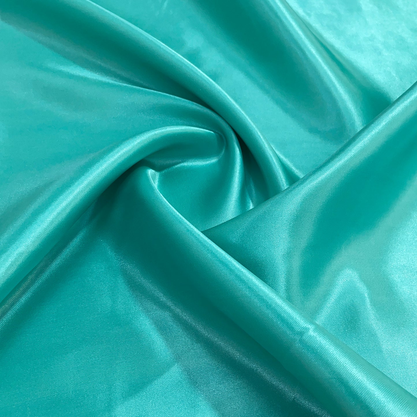 Seafoan Green Solid Satin Fabric - TradeUNO