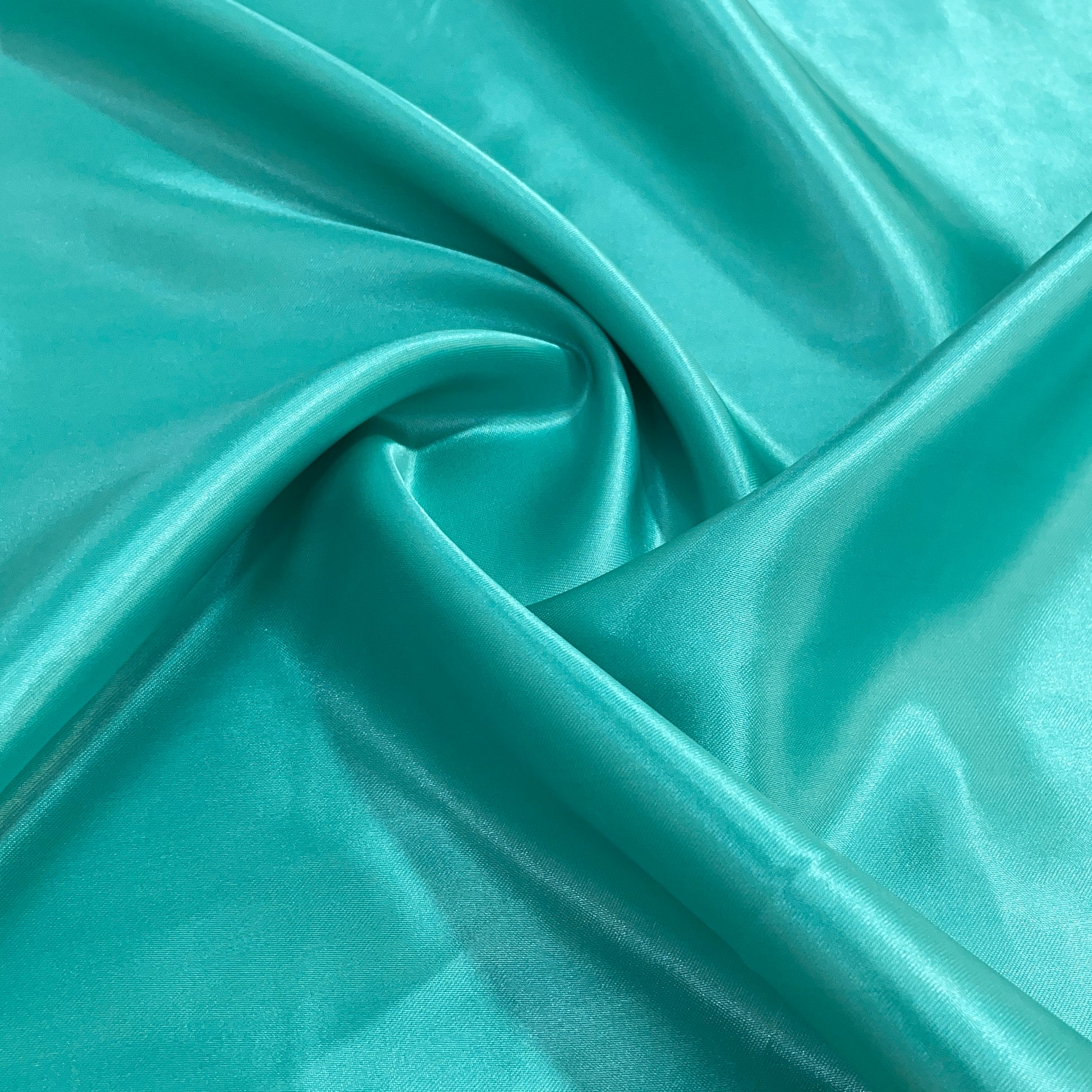 Seafoan Green Solid Satin Fabric - TradeUNO
