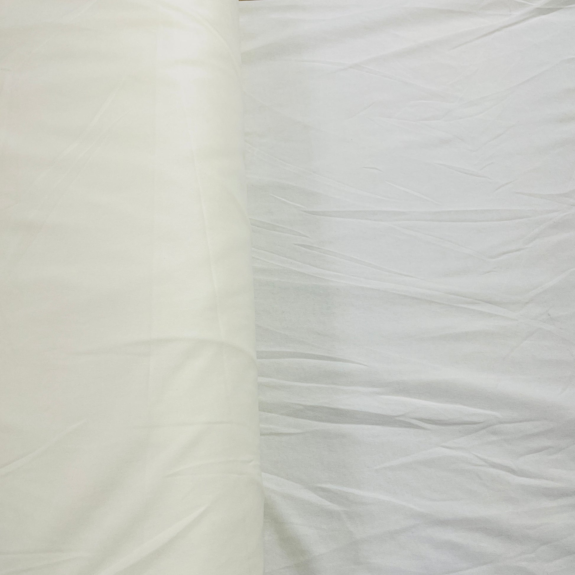Off White Solid Lycra Dyed Fabric