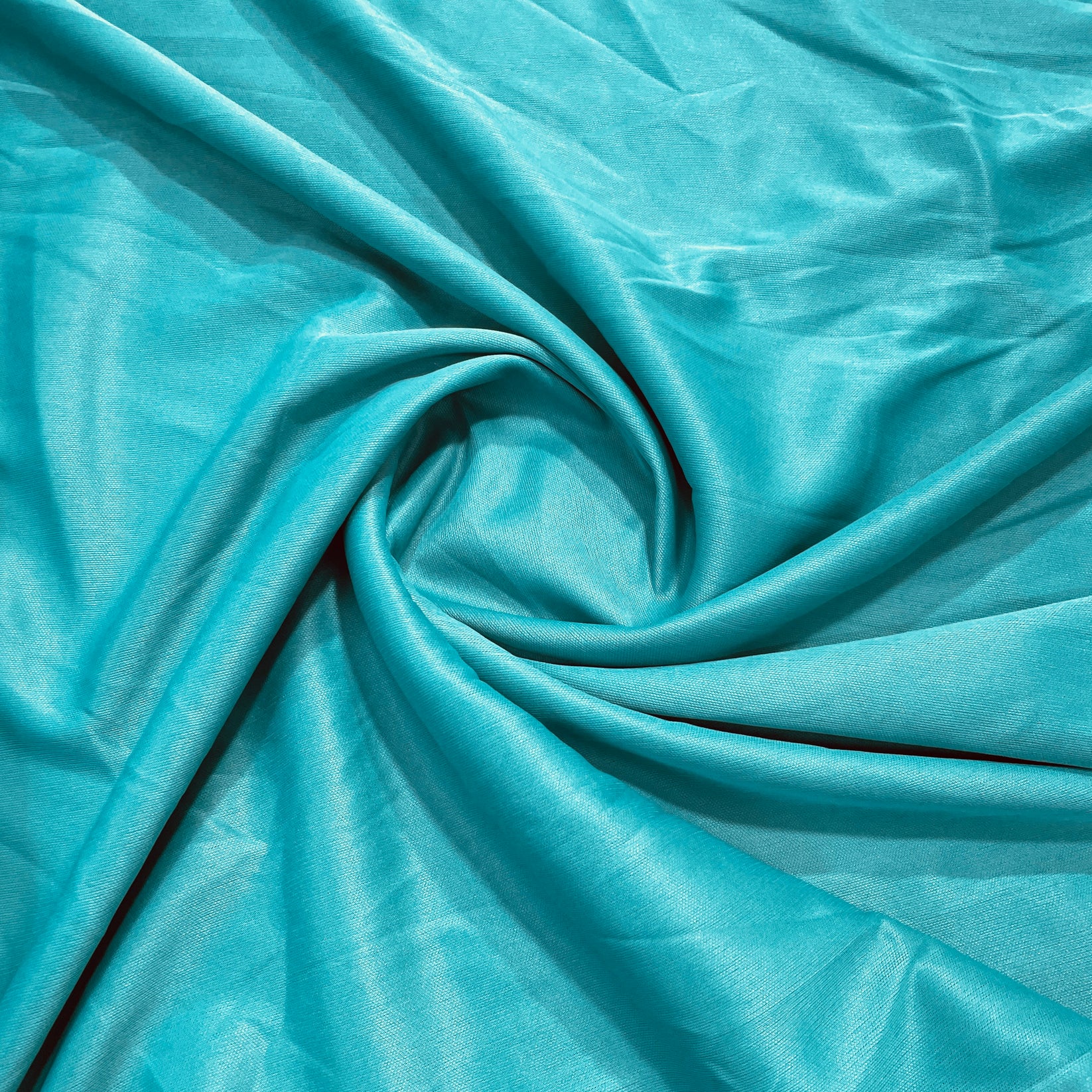 Buy Emerald Green Solid Lycra Dyed Fabric Online TradeUNO Fabrics